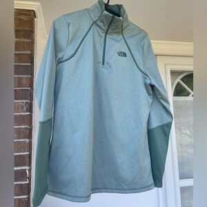 The North Face Men's Gray and Green quarter-zip.